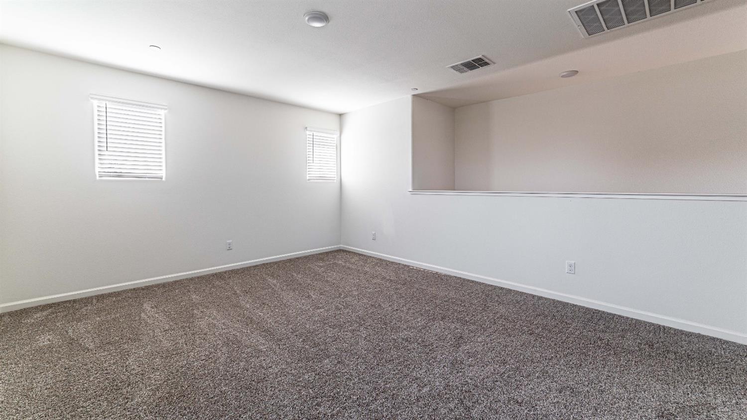 512 Barbara Avenue Sanger, CA 93657 - Photo 21 of 40 a view of an empty room with a window