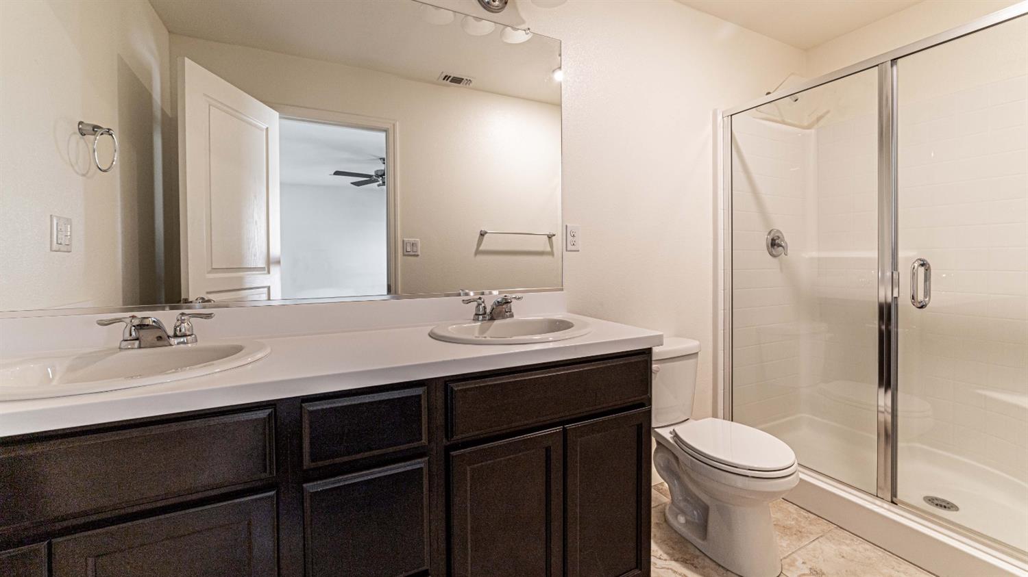 512 Barbara Avenue Sanger, CA 93657 - Photo 24 of 40 a bathroom with a sink toilet and shower