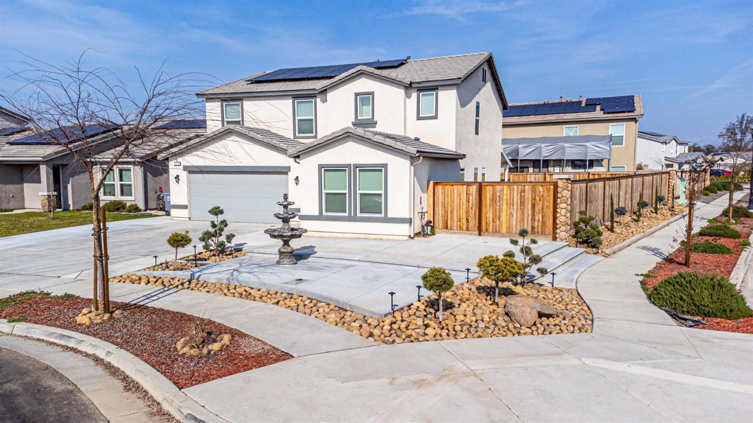 512 Barbara Avenue Sanger, CA 93657 - Photo 3 of 40 a front view of a house with garden