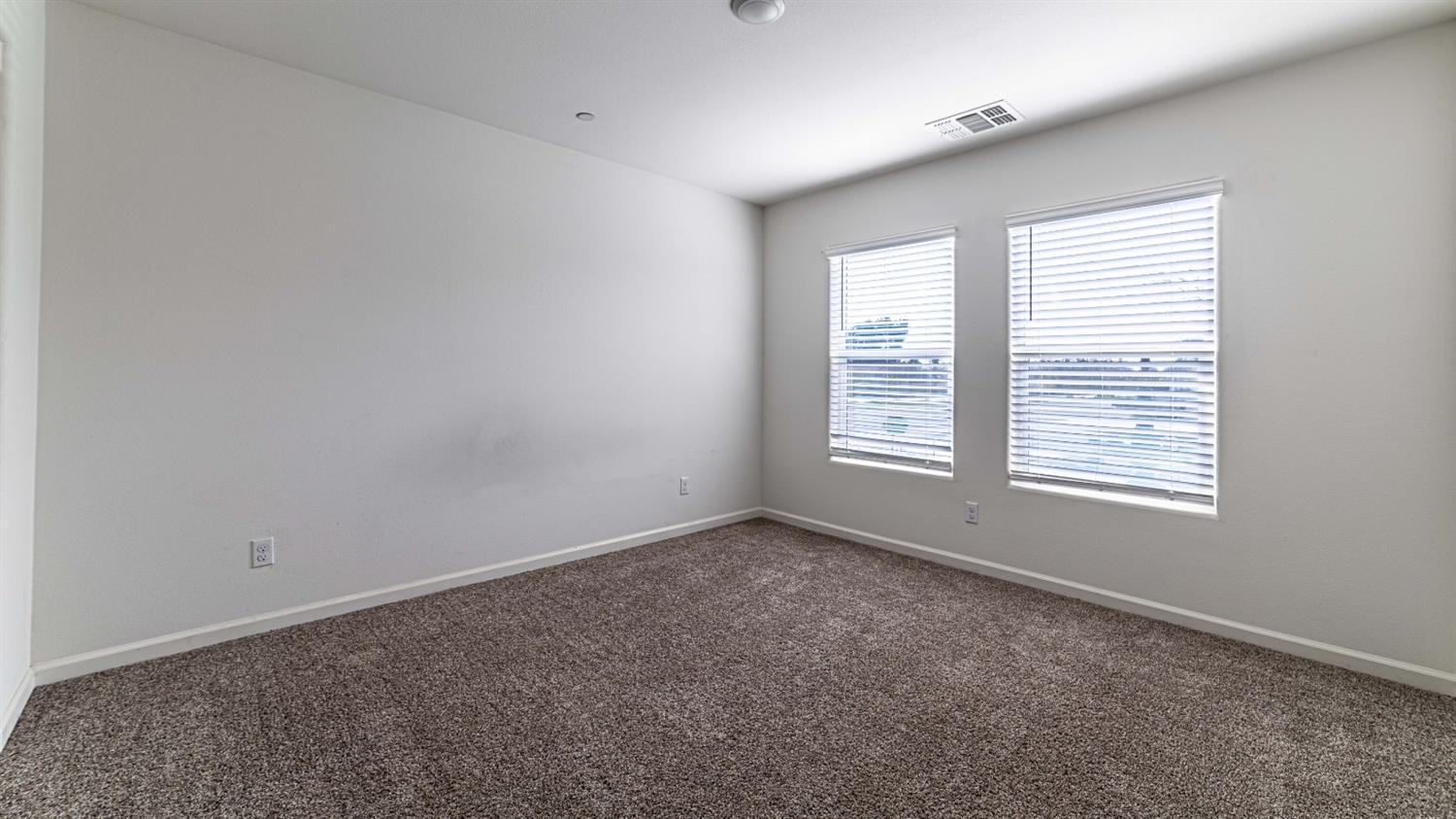 512 Barbara Avenue Sanger, CA 93657 - Photo 33 of 40 a view of an empty room with a window