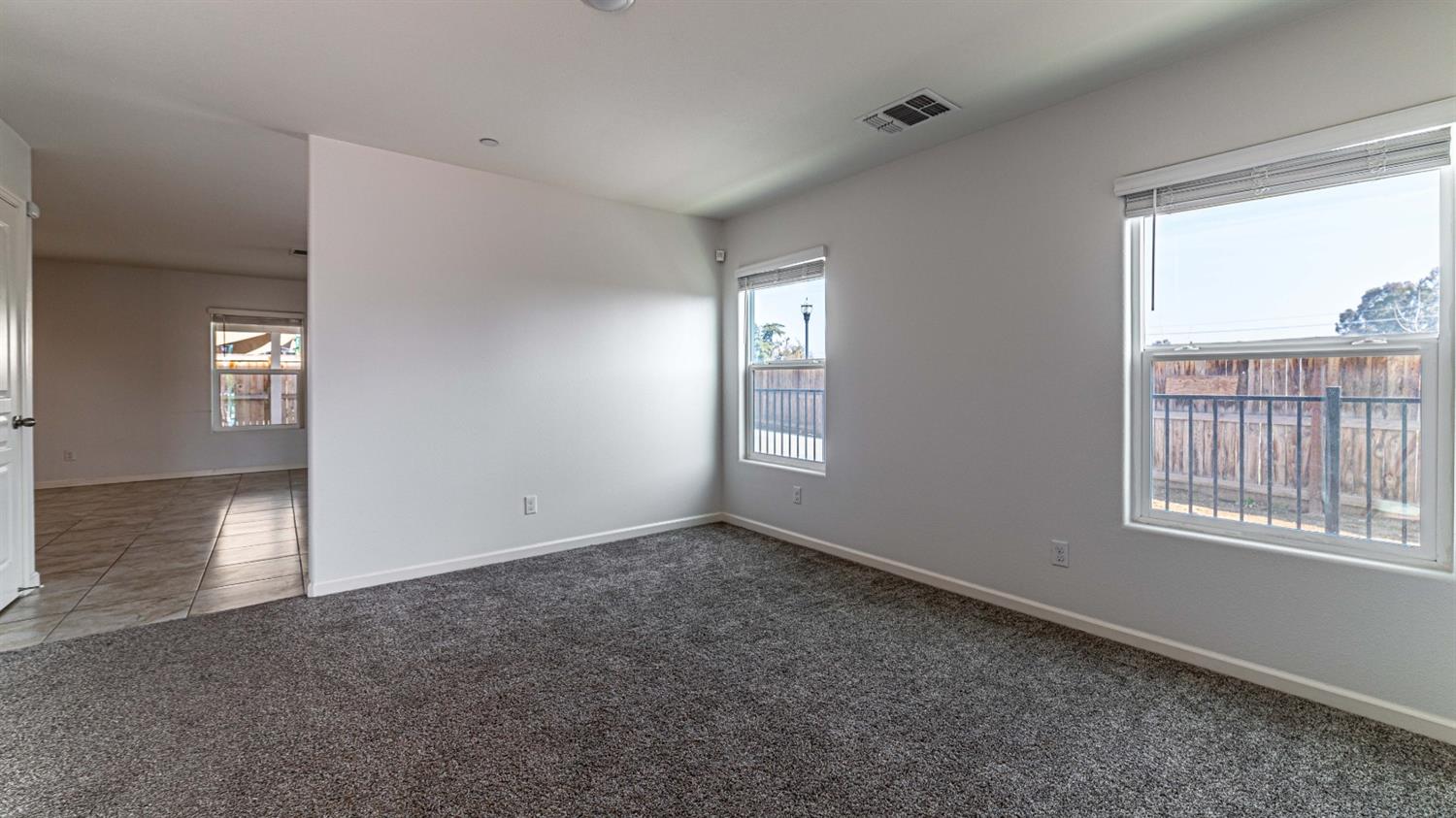 512 Barbara Avenue Sanger, CA 93657 - Photo 35 of 40 an empty room with windows