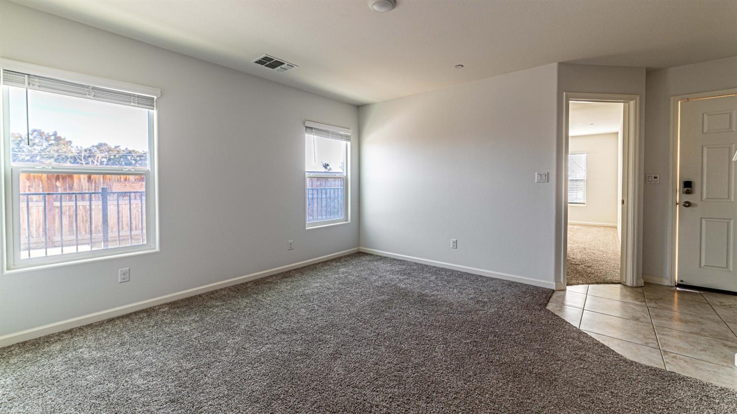 512 Barbara Avenue Sanger, CA 93657 - Photo 38 of 40 an empty room with windows