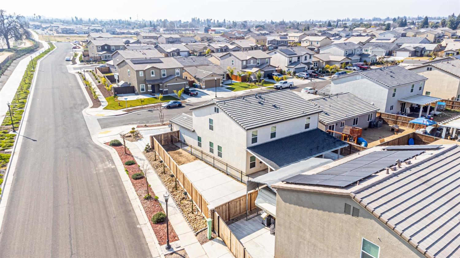 512 Barbara Avenue Sanger, CA 93657 - Photo 7 of 40 a view of a city with tall buildings