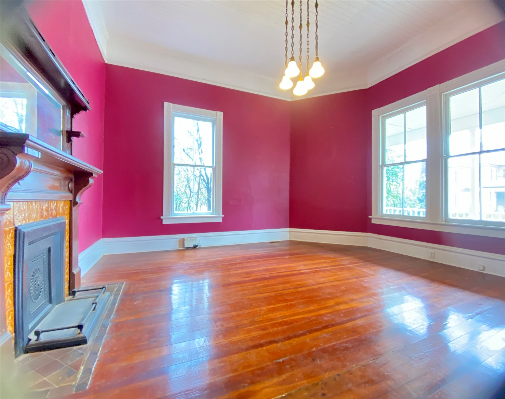 223 East Robert Toombs Avenue Washington, GA 30673 - Photo 24 of 46 a view of empty room with wooden floor and fan