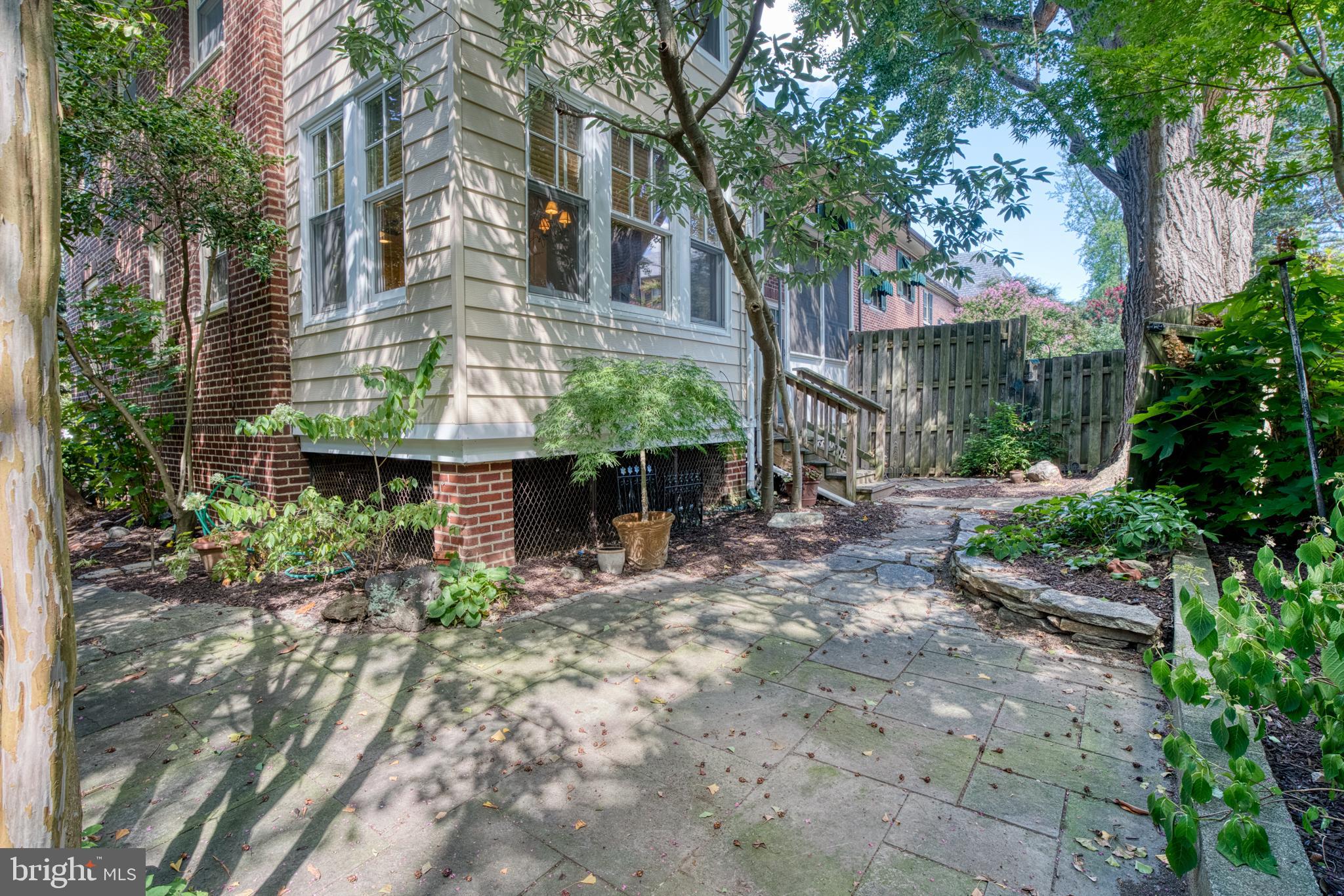 3925 Canterbury Road Baltimore, MD 21218 - Photo 54 of 65 a front view of a house with garden