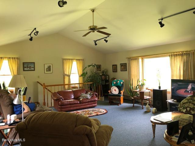 2153 Hancock Road Hancock, MA 01267 - Photo 7 of 24 a living room with furniture a window and a chandelier