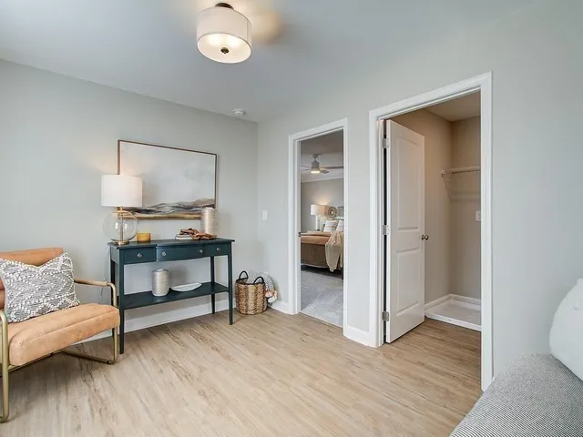 a view of kitchen with furniture and wooden floor