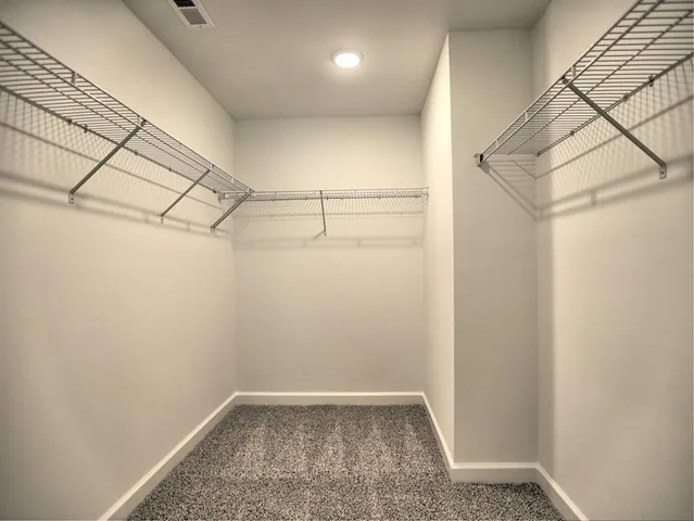 a bathroom with a shower and a bath tub