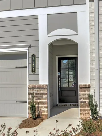 a view of houses with outdoor space and sitting area