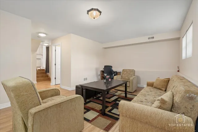 a living room with furniture and a couch