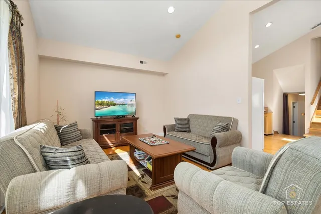 a living room with furniture and a couch