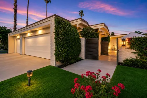 a picture of a house with a yard
