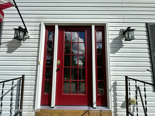 a view of a entryway door of the house