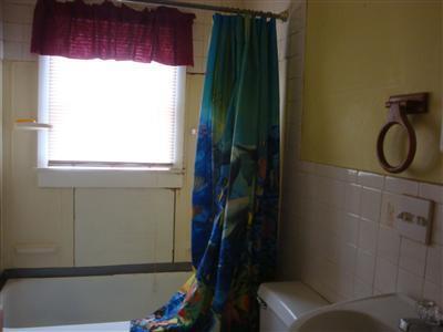 41 Spring Street, Unit 12 Hyannis, MA 02601 - Photo 8 of 11 a bathroom with a toilet and a sink