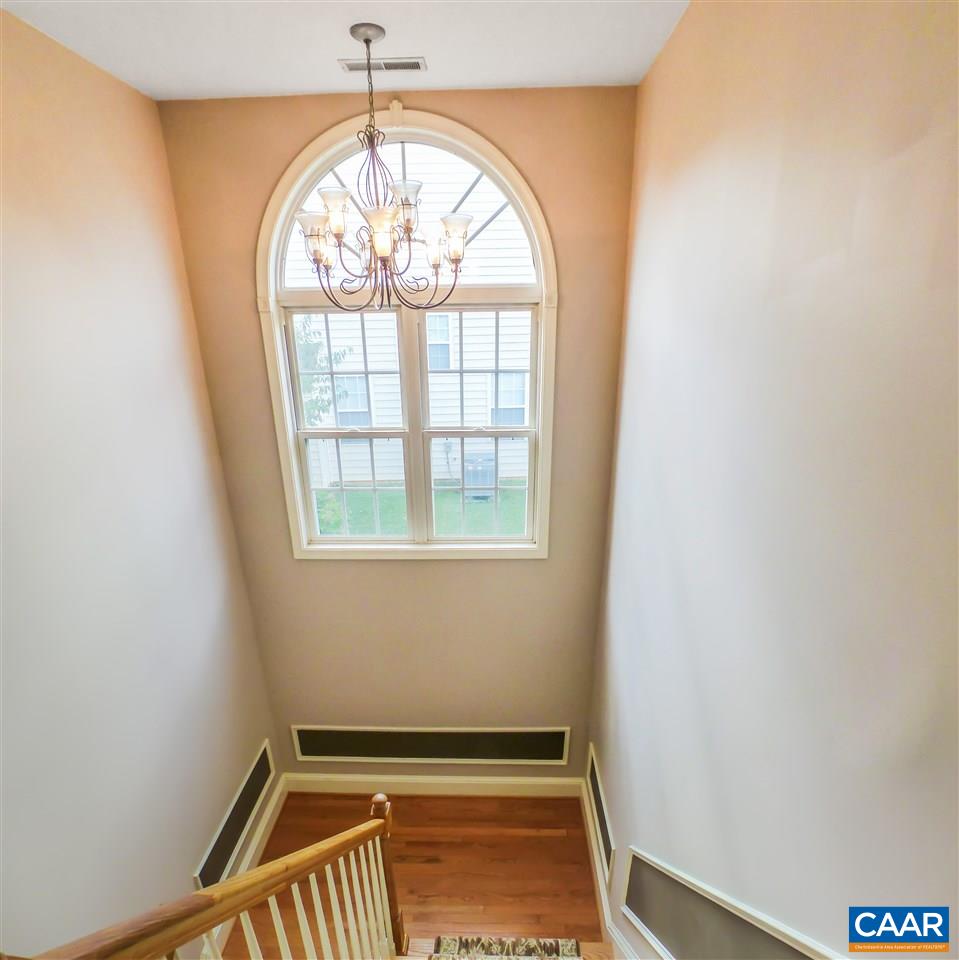 5372 Windy Ridge Road Charlottesville, VA 22903 - Photo 18 of 41 an empty room with windows
