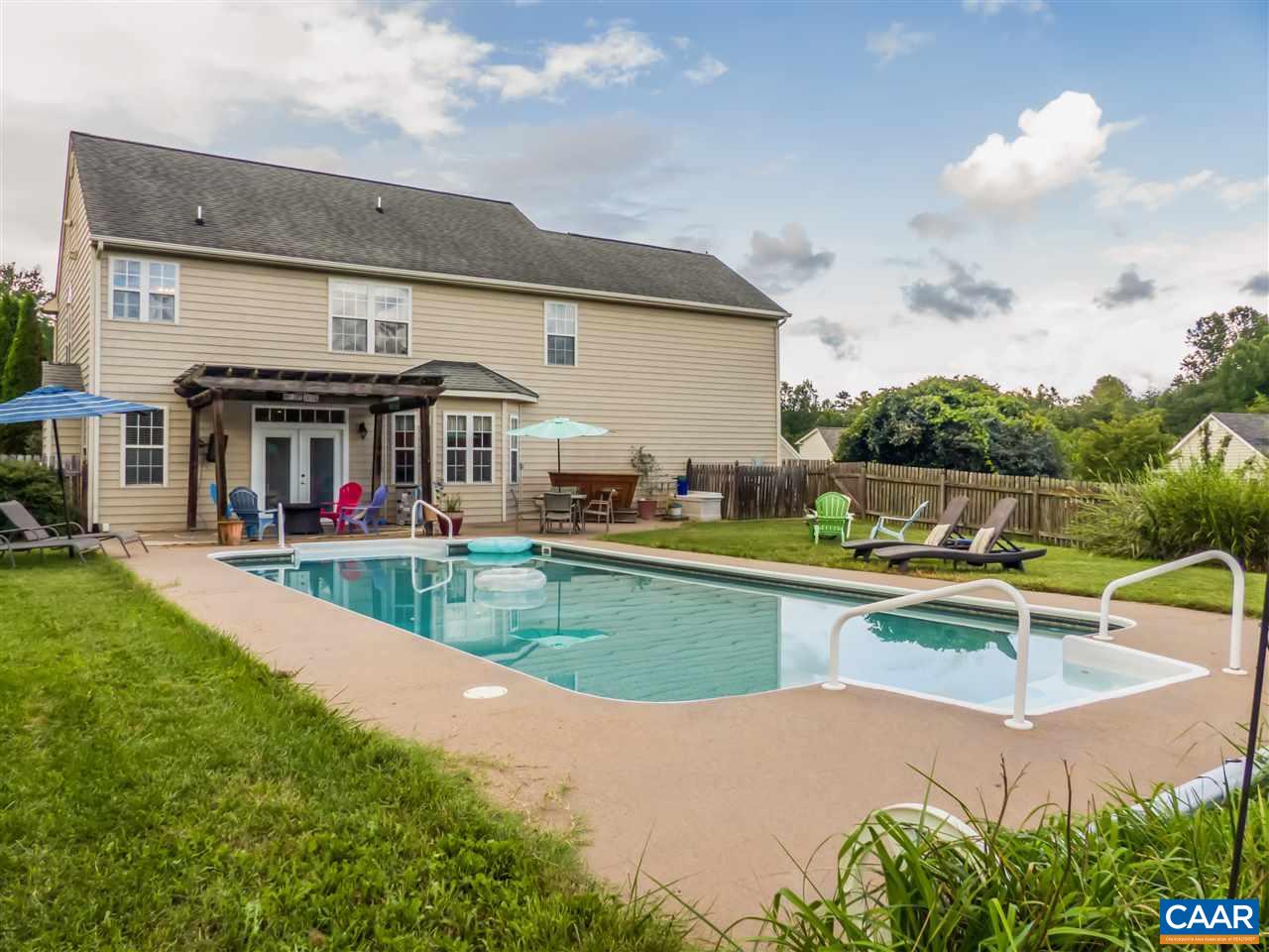 5372 Windy Ridge Road Charlottesville, VA 22903 - Photo 33 of 41 a view of a house with swimming pool and a yard