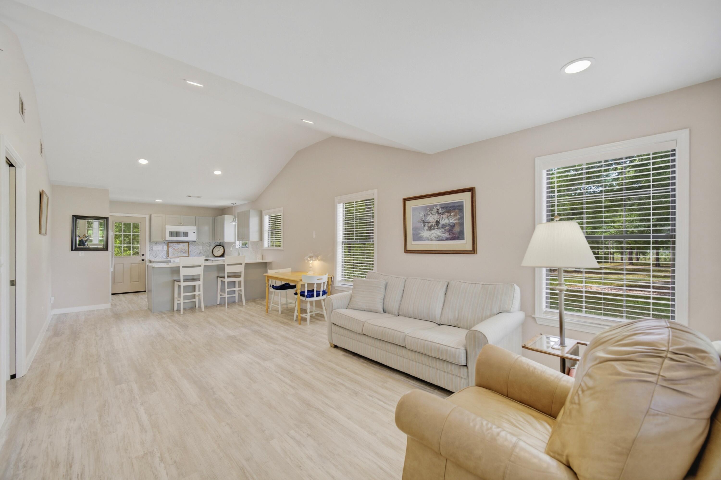 261 Wilkerson Road DeFuniak Springs, FL 32433 - Photo 50 of 76 a living room with furniture and a large window