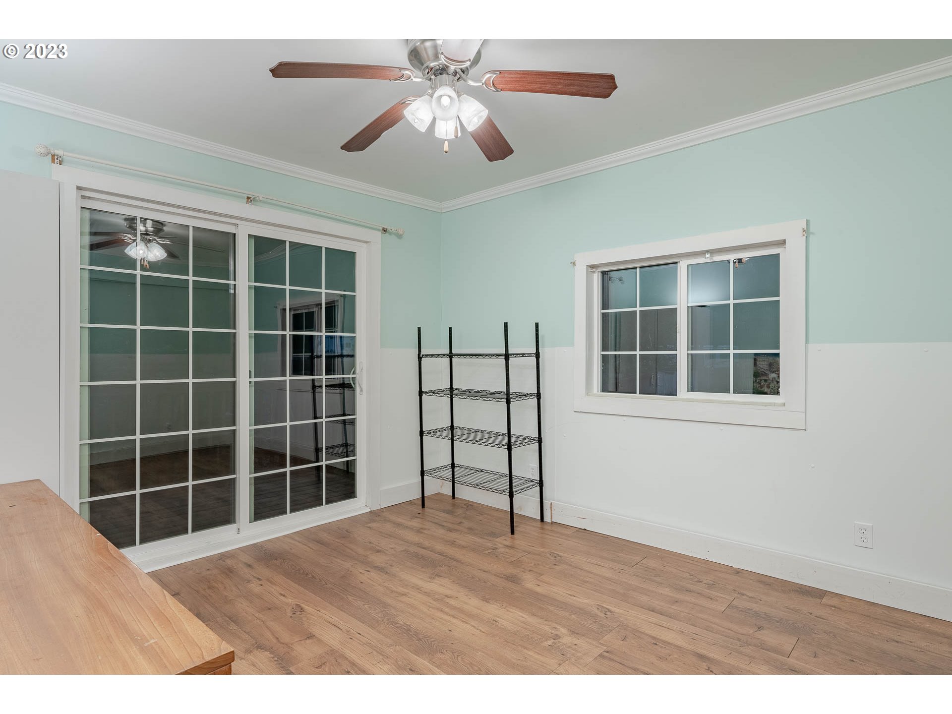 2075 Northeast Mossy Loop Toledo, OR 97391 - Photo 13 of 38 a view of empty room with windows and ceiling fan