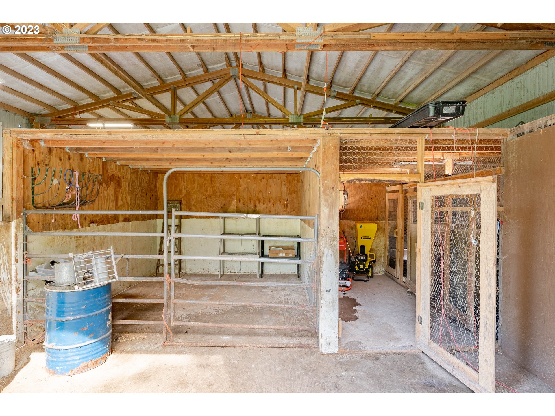 2075 Northeast Mossy Loop Toledo, OR 97391 - Photo 17 of 38 a view of a room with racks on the wall