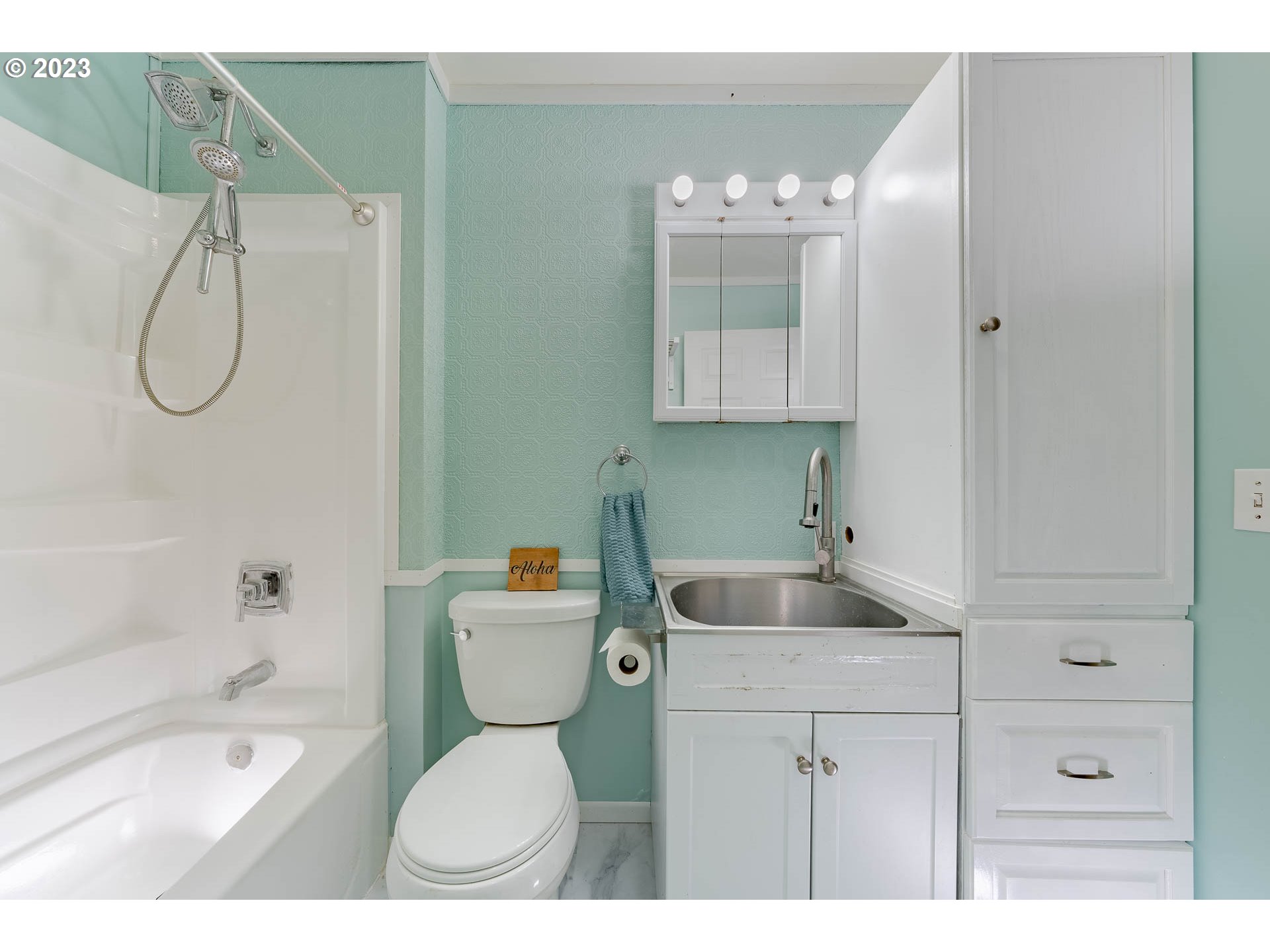 2075 Northeast Mossy Loop Toledo, OR 97391 - Photo 28 of 38 a bathroom with a sink a toilet and shower