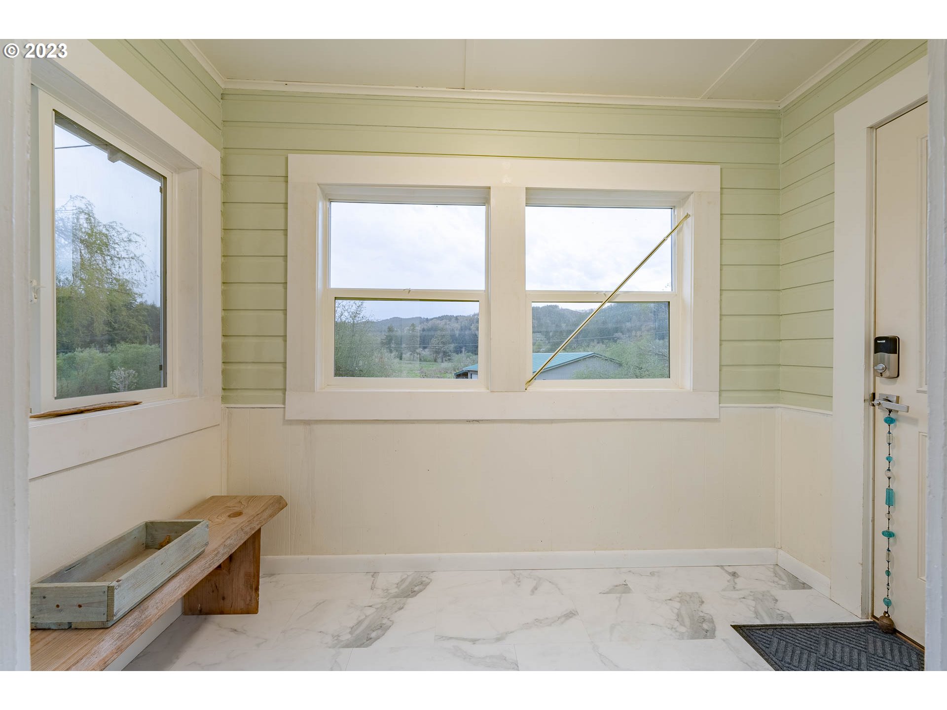 2075 Northeast Mossy Loop Toledo, OR 97391 - Photo 3 of 38 a view of an empty room and window