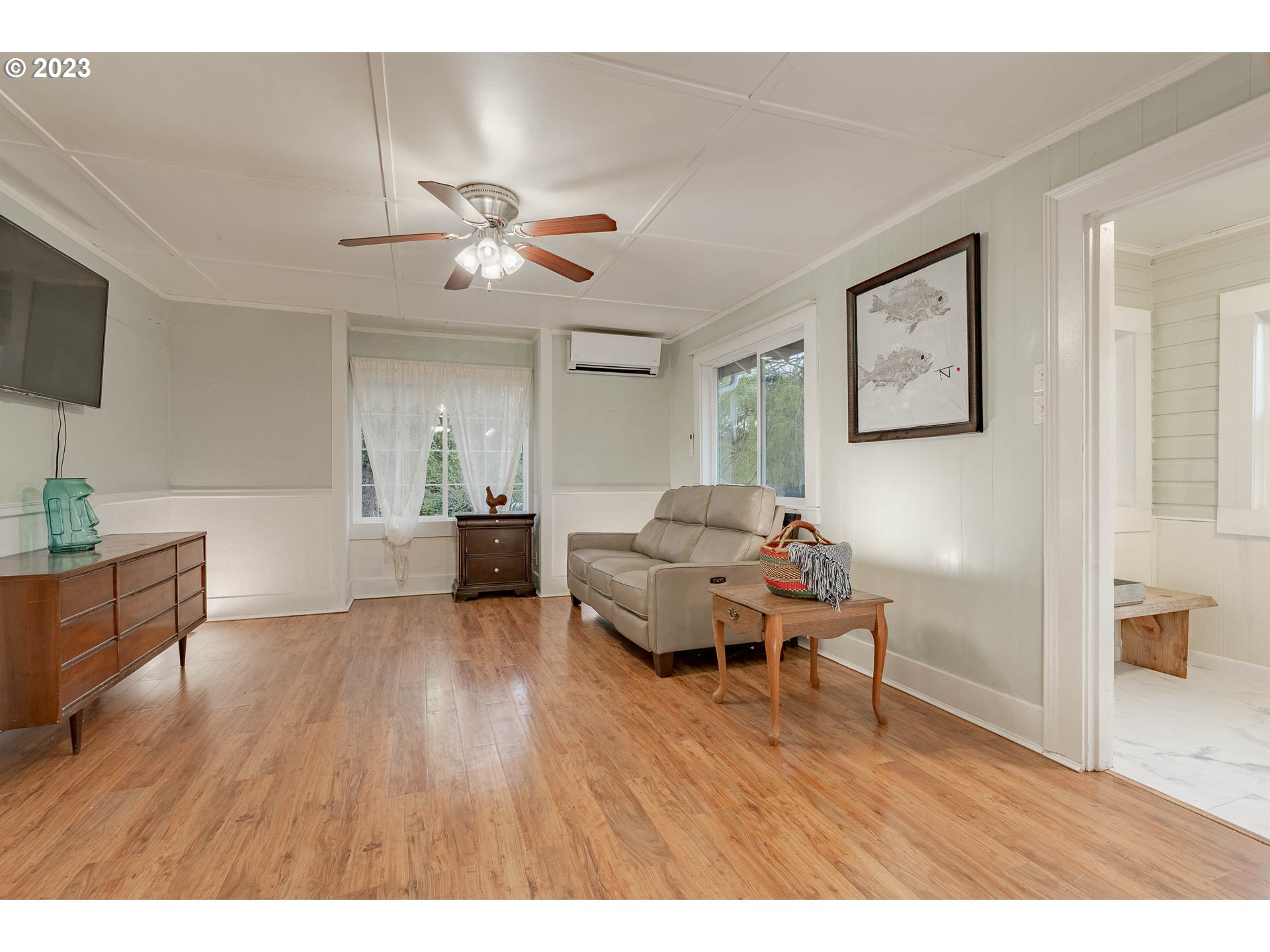 2075 Northeast Mossy Loop Toledo, OR 97391 - Photo 6 of 38 a living room with furniture and a wooden floor