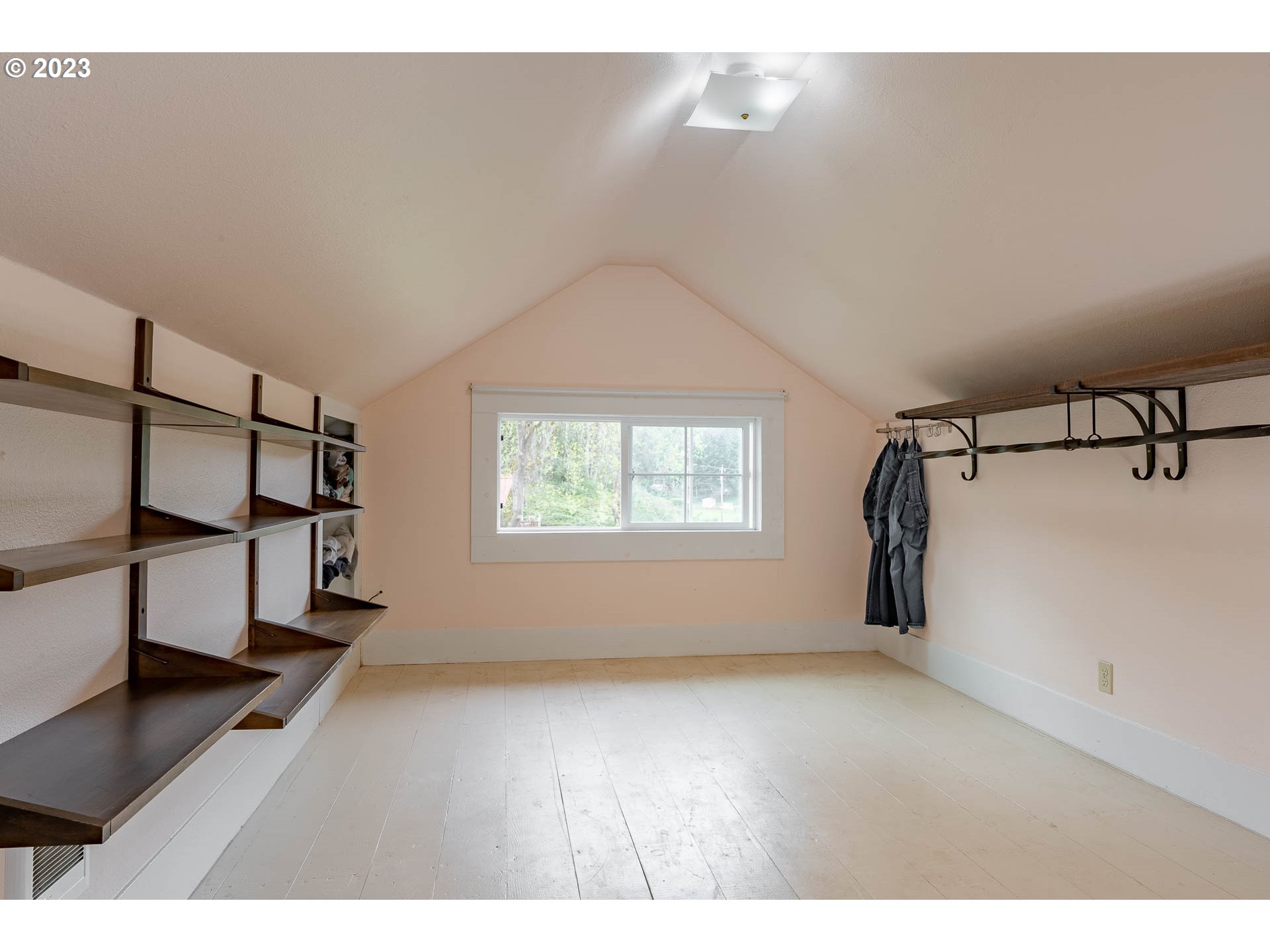 2075 Northeast Mossy Loop Toledo, OR 97391 - Photo 9 of 38 a view of entryway with stairs and wooden floor