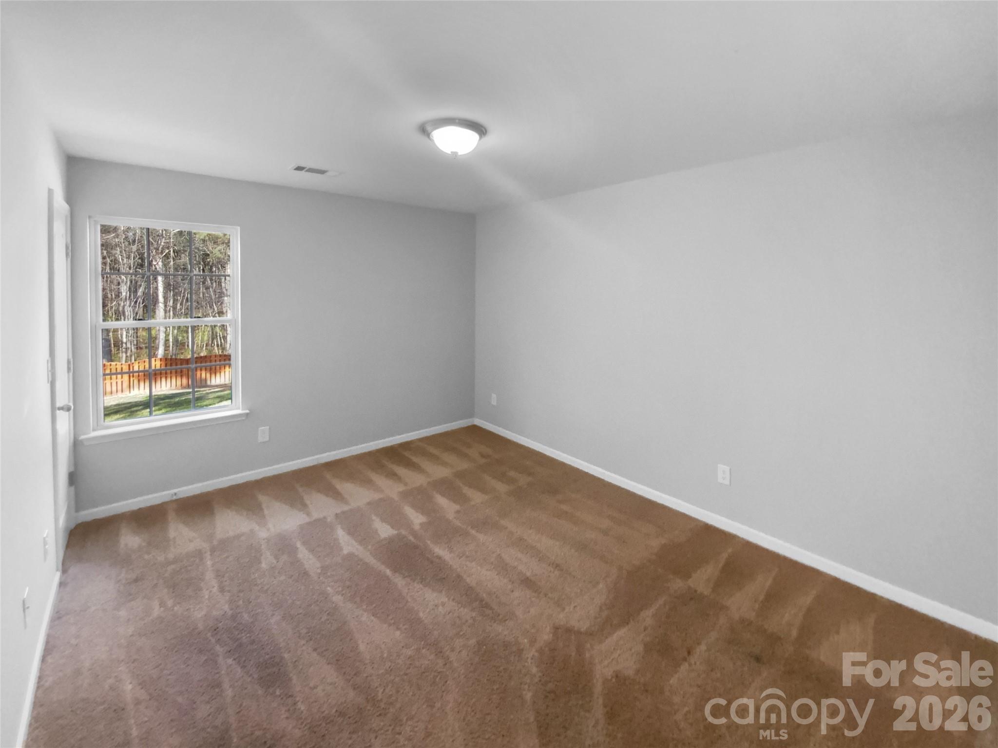 4115 Granite Street Midland, NC 28107 - Photo 15 of 25 a view of an empty room with a window