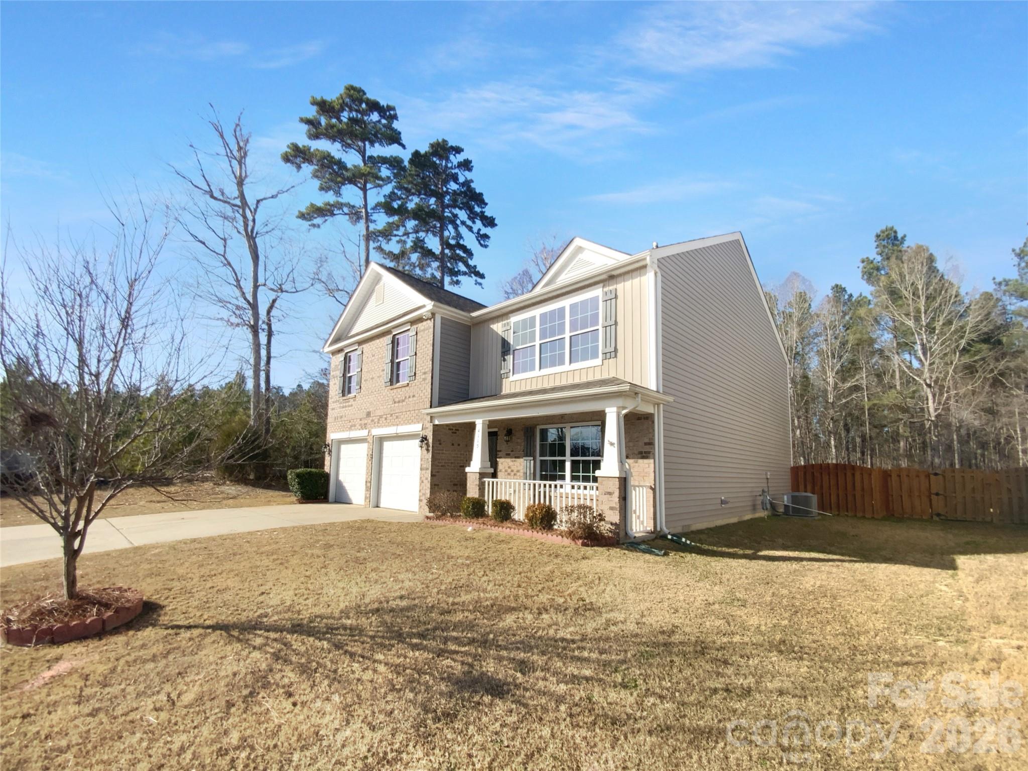 4115 Granite Street Midland, NC 28107 - Photo 24 of 25 a front view of a house with a yard
