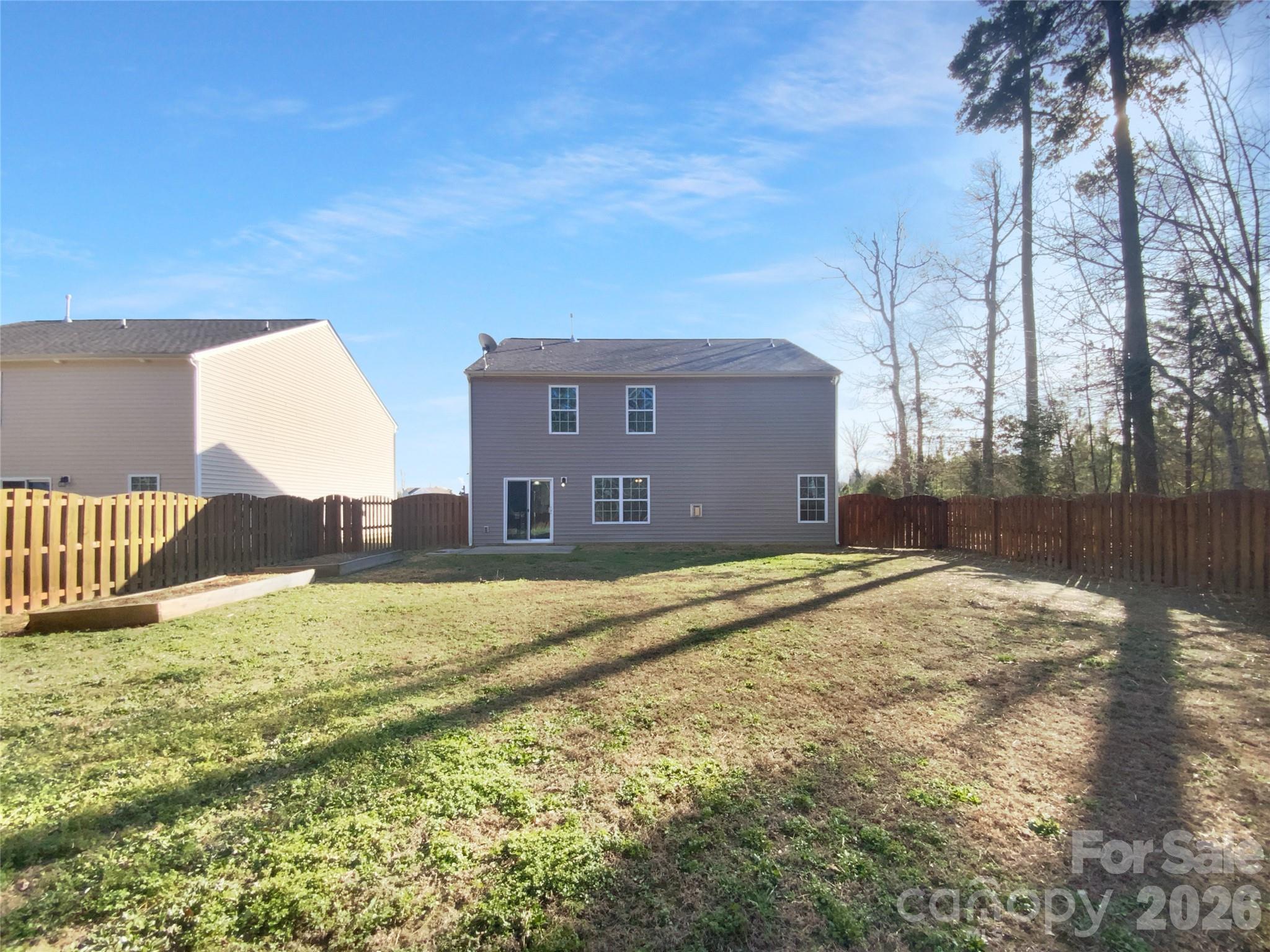 4115 Granite Street Midland, NC 28107 - Photo 5 of 25 a view of a house with a yard and garage
