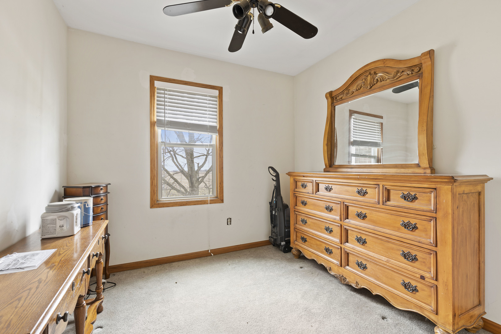 9407 Riley Road Marengo, IL 60152 - Photo 15 of 37 a bedroom with a bed and a dresser in it