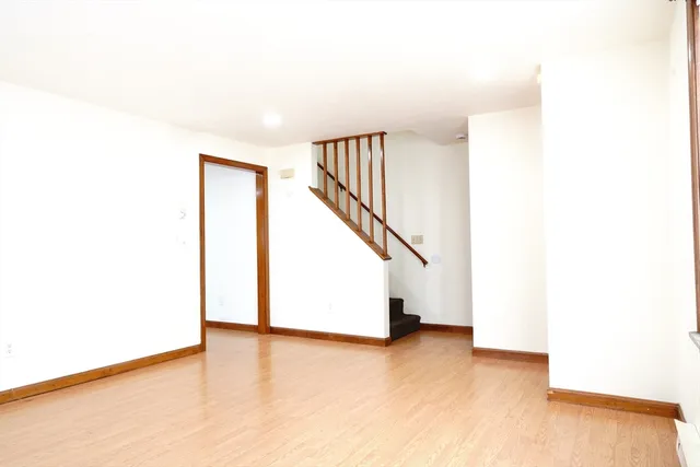 a view of a hallway with staircase