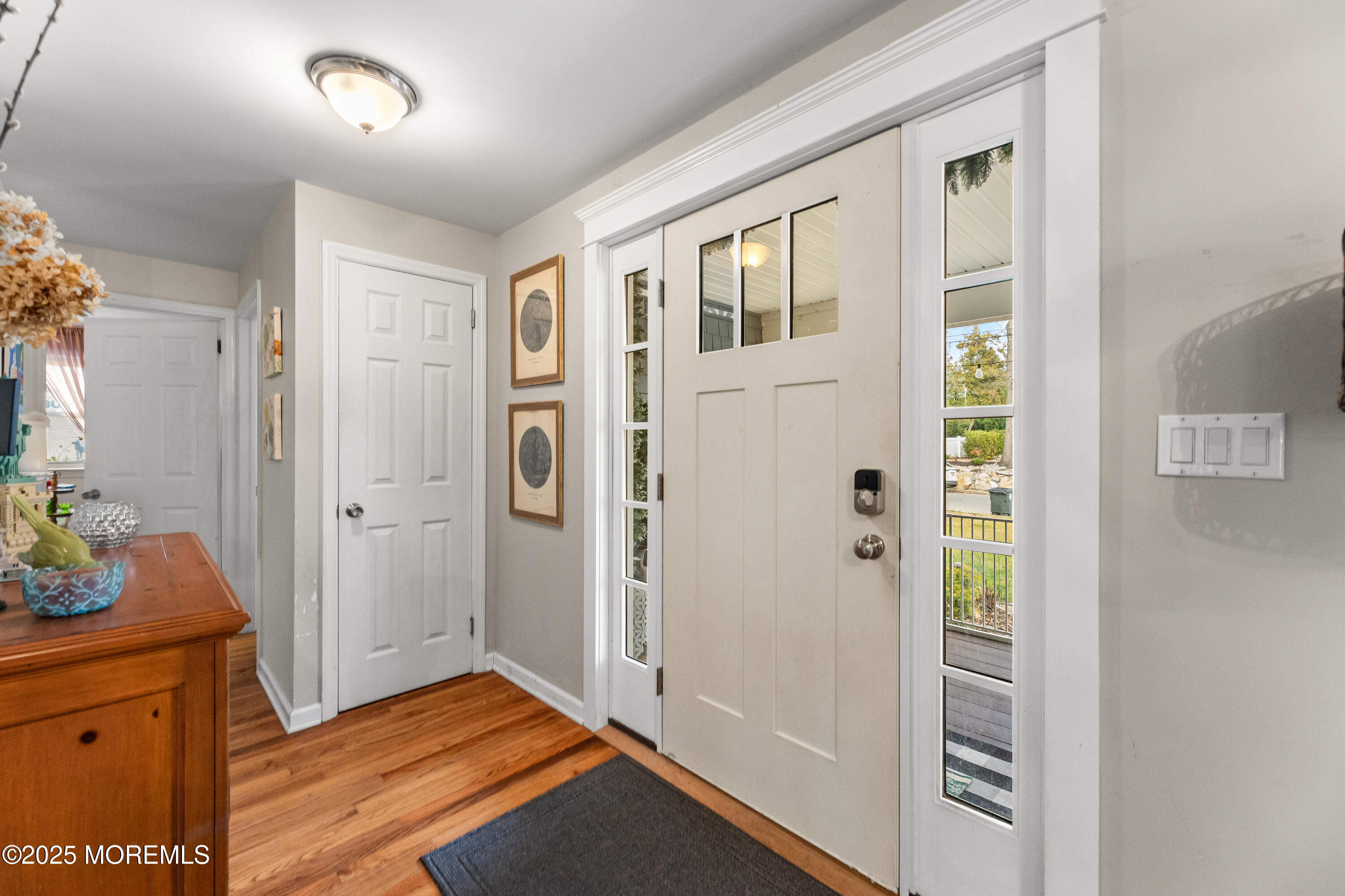1609 Wight Street Wall, NJ 07719 - Photo 11 of 39 a view of livingroom with hardwood floor and hallway