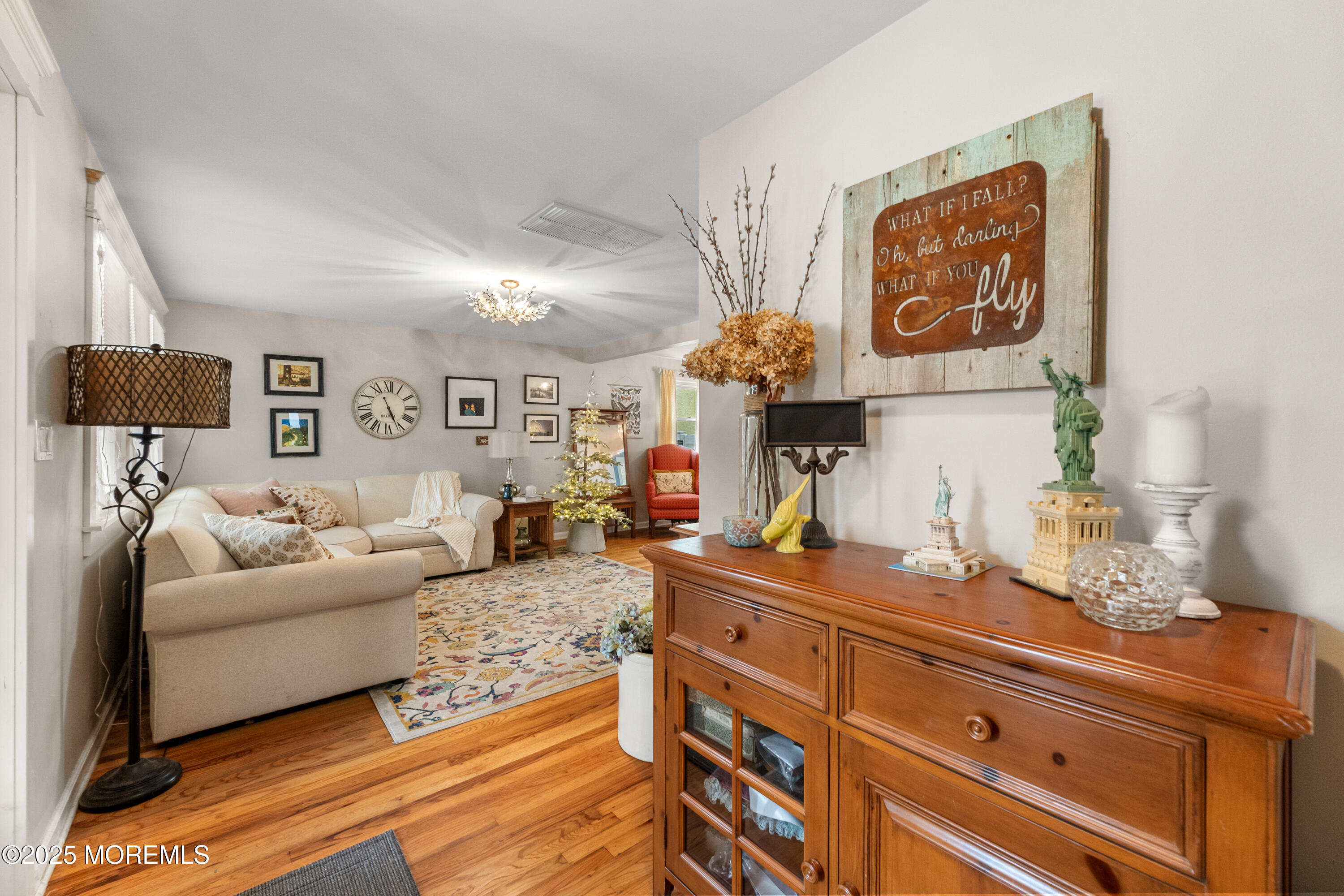 1609 Wight Street Wall, NJ 07719 - Photo 12 of 39 a living room with furniture and a lamp