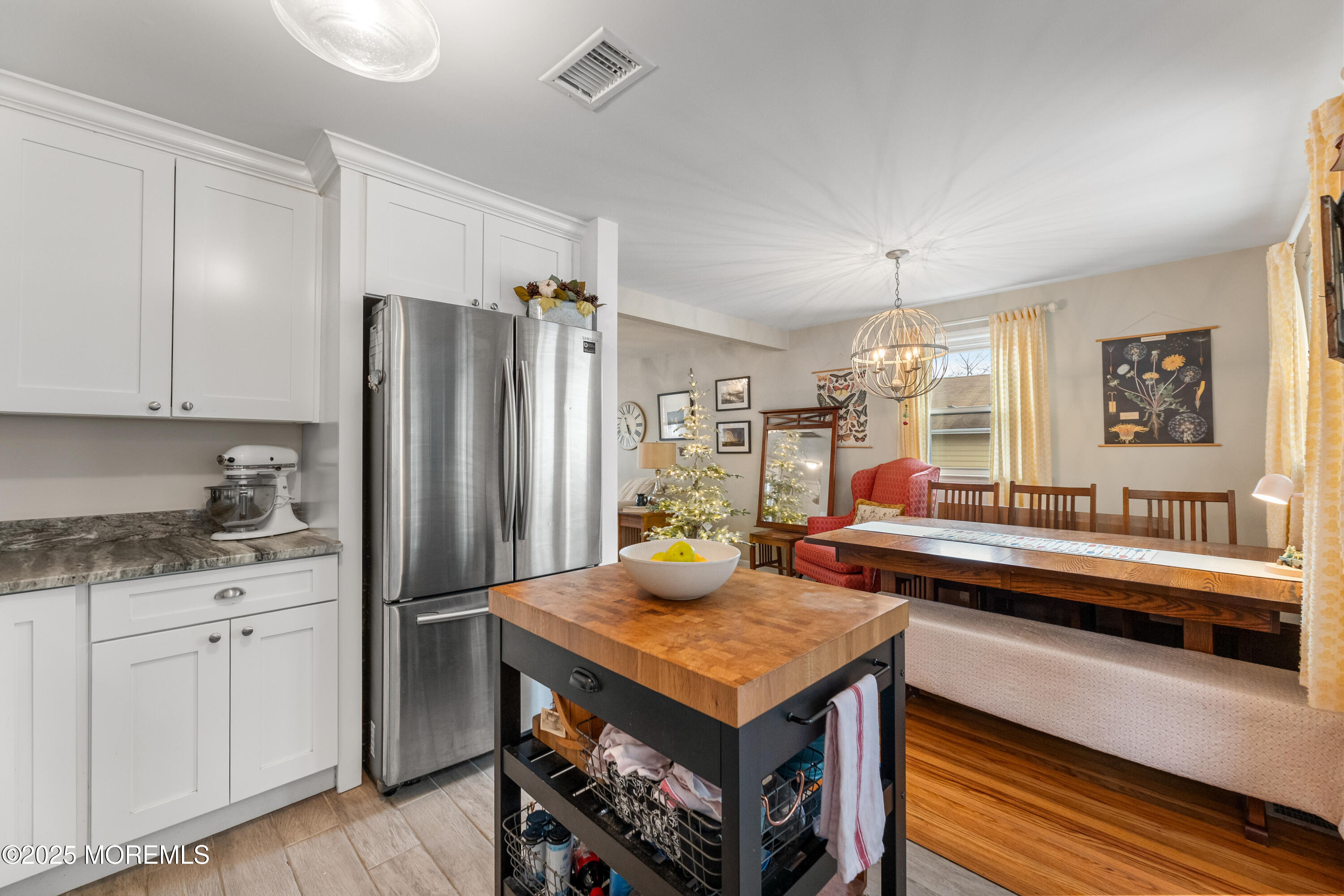 1609 Wight Street Wall, NJ 07719 - Photo 20 of 39 a kitchen with stainless steel appliances a sink stove and refrigerator