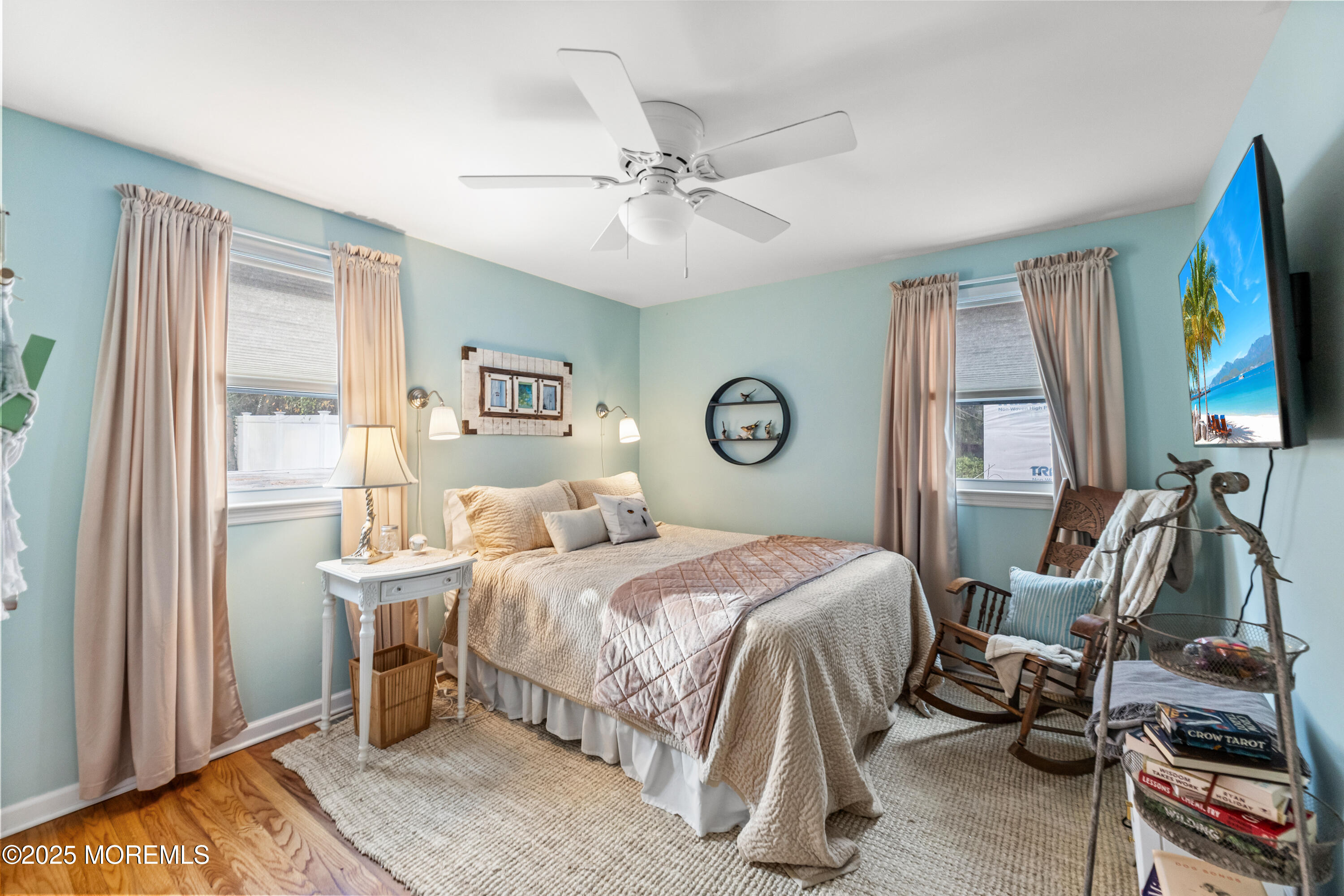 1609 Wight Street Wall, NJ 07719 - Photo 22 of 39 a bedroom with a bed and a flat tv screen on dresser