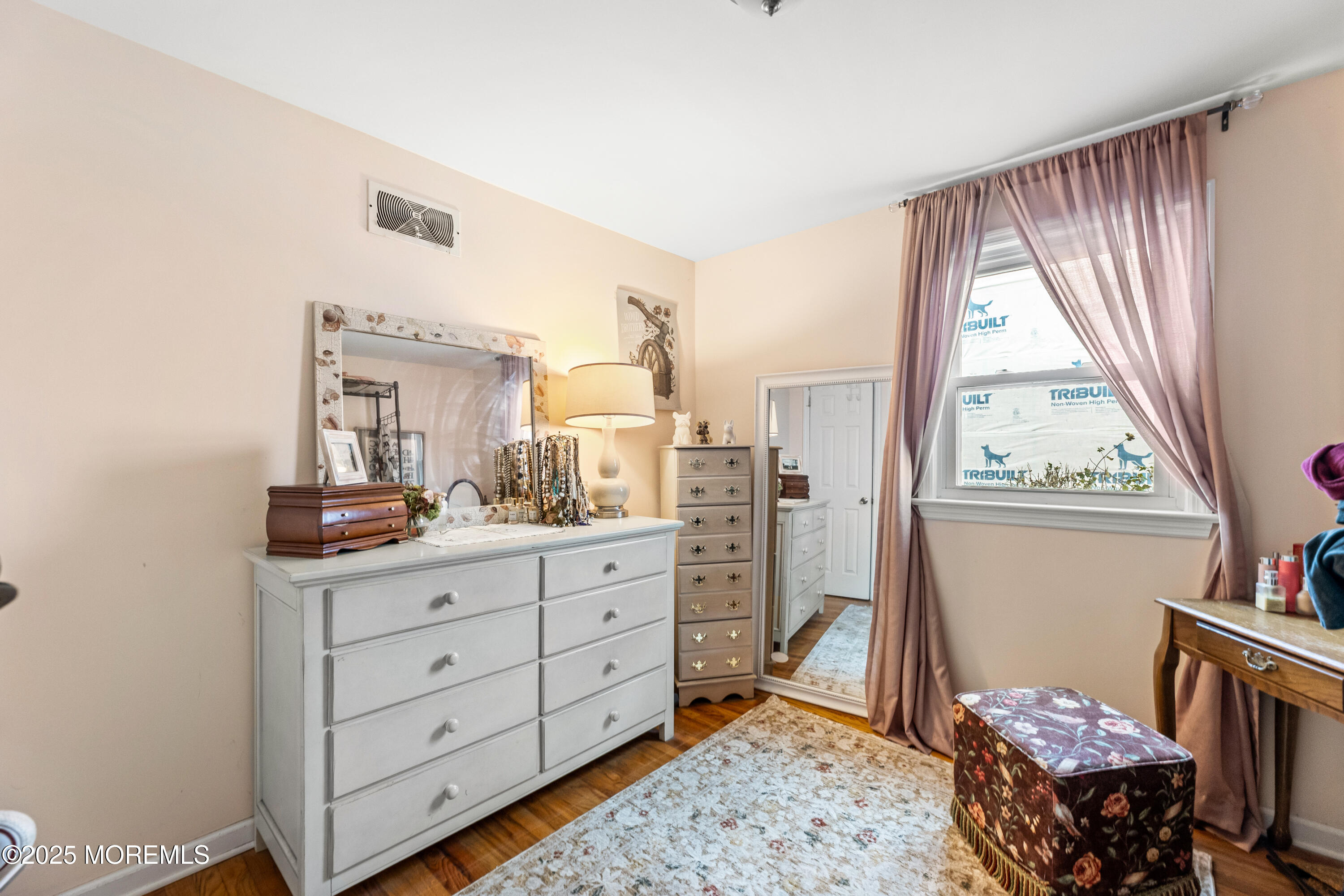 1609 Wight Street Wall, NJ 07719 - Photo 25 of 39 a room with a dresser and a window