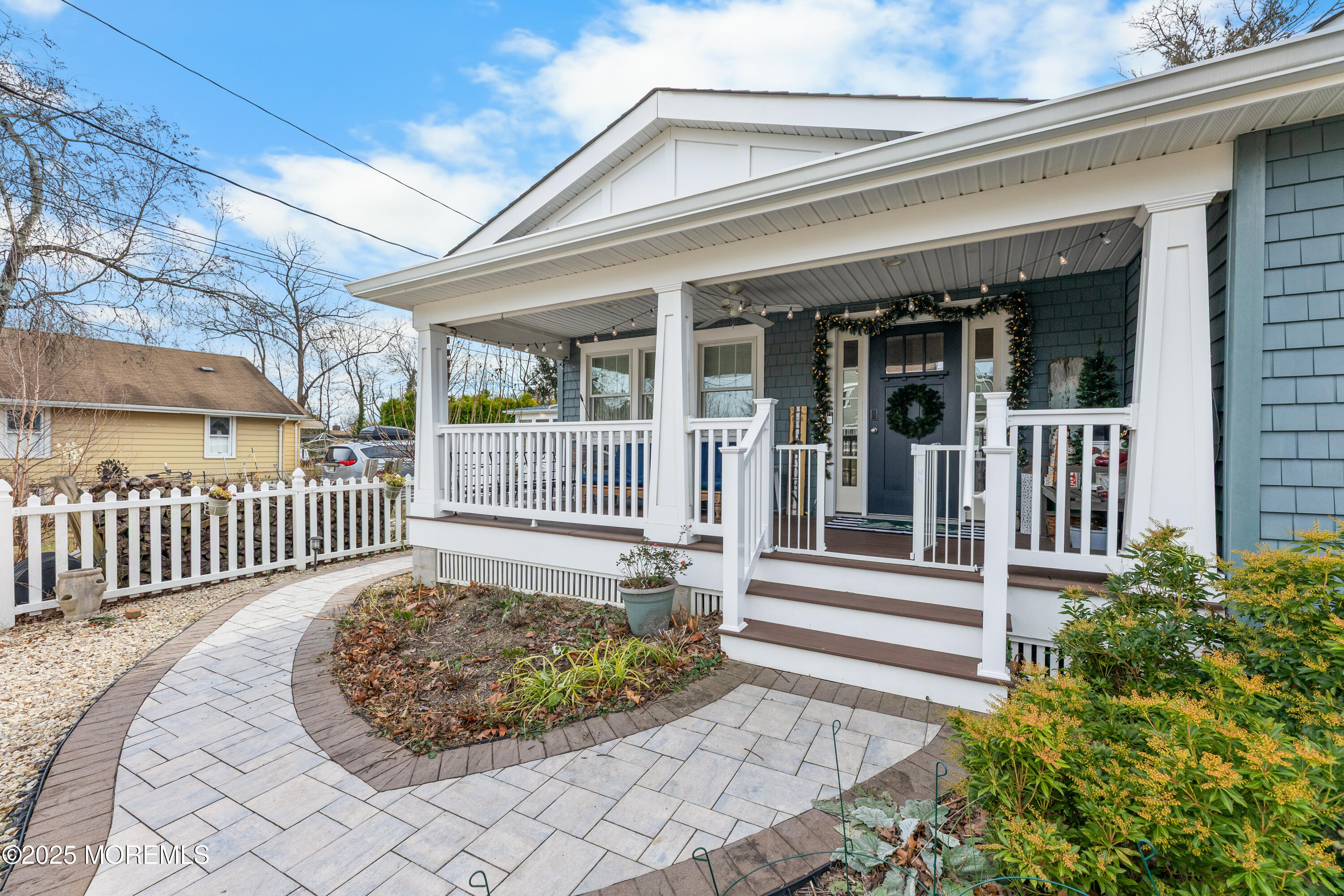 1609 Wight Street Wall, NJ 07719 - Photo 5 of 39 a view of a house with a small yard and wooden floor and fence