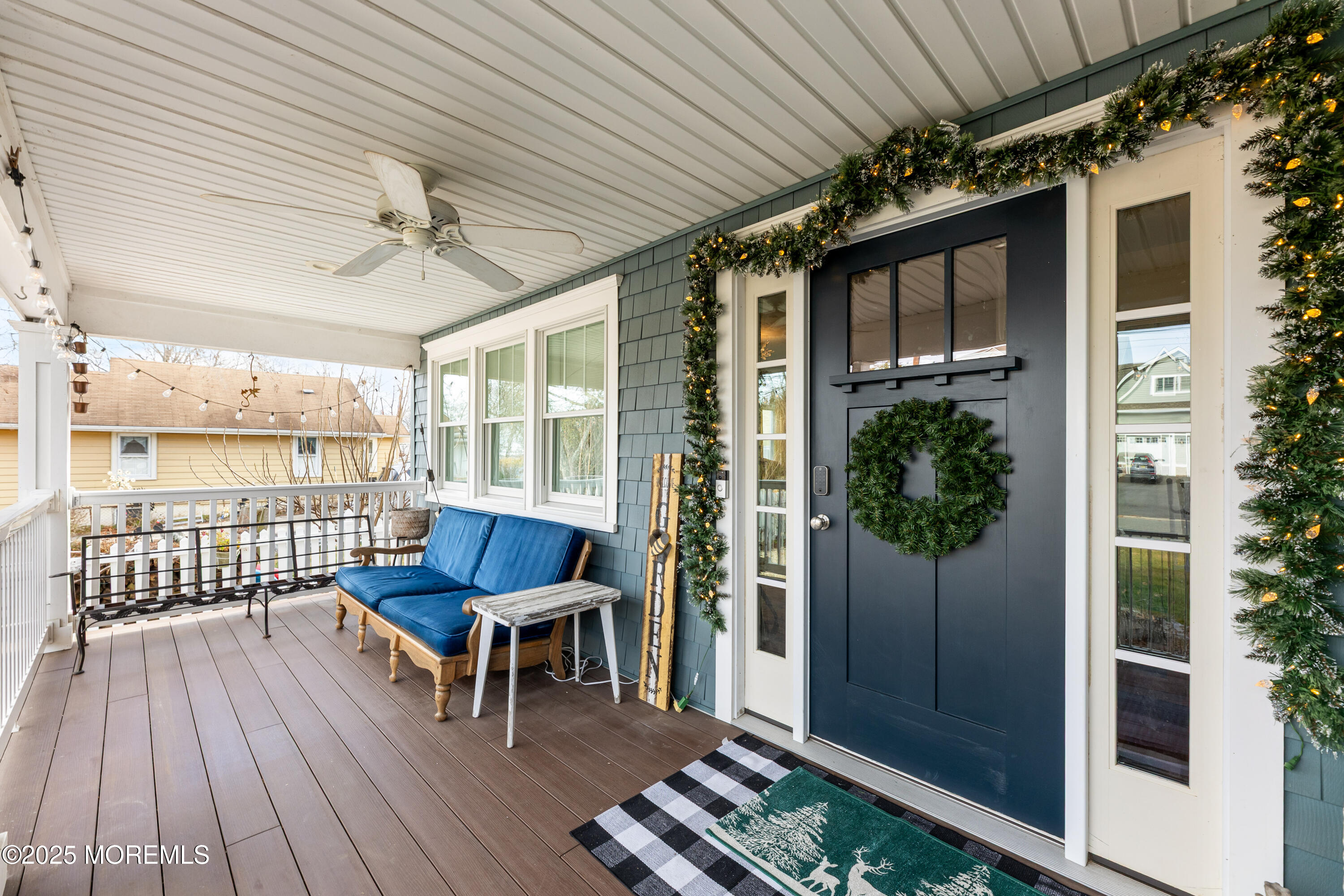 1609 Wight Street Wall, NJ 07719 - Photo 9 of 39 a view of a porch with furniture and wooden floor