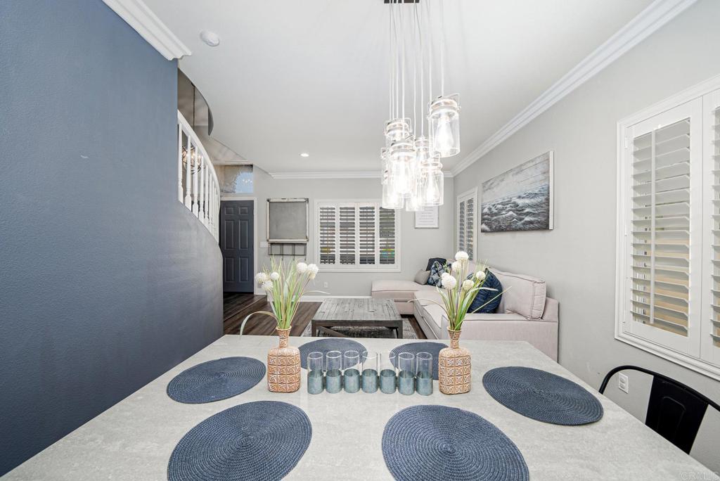23 Wayfaire Rancho Santa Margarita, CA 92688 - Photo 14 of 44 a living room with furniture and a chandelier