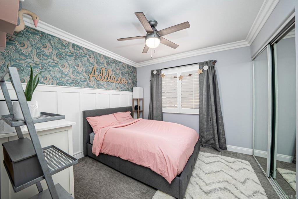 23 Wayfaire Rancho Santa Margarita, CA 92688 - Photo 19 of 44 a bedroom with a bed and window