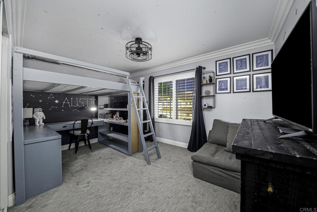 23 Wayfaire Rancho Santa Margarita, CA 92688 - Photo 23 of 44 a living room with furniture and a flat screen tv