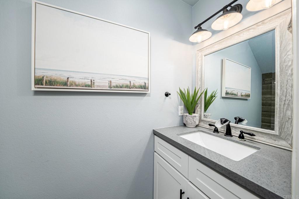 23 Wayfaire Rancho Santa Margarita, CA 92688 - Photo 24 of 44 a bathroom with a sink and a mirror