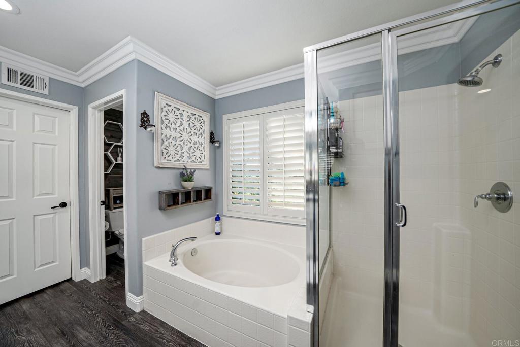 23 Wayfaire Rancho Santa Margarita, CA 92688 - Photo 29 of 44 a white bath tub sitting next to a shower