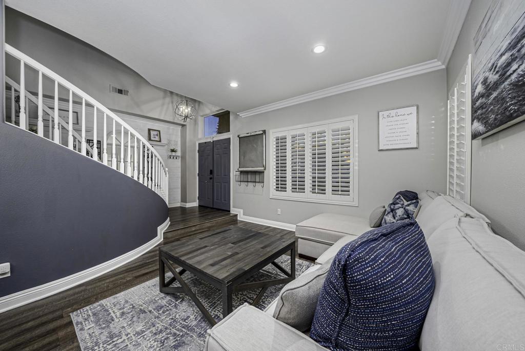 23 Wayfaire Rancho Santa Margarita, CA 92688 - Photo 8 of 44 a bedroom with furniture and a window