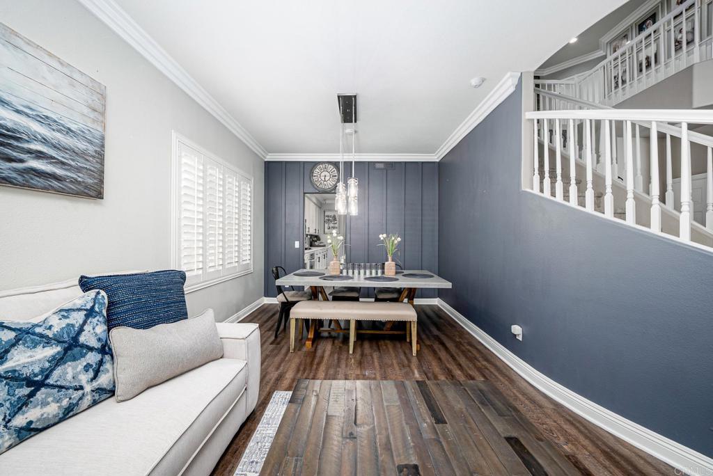 23 Wayfaire Rancho Santa Margarita, CA 92688 - Photo 10 of 44 a living room with furniture and a wooden floor