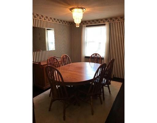 411 Southampton Road Holyoke, MA 01040 - Photo 15 of 27 a view of a dining room with furniture and window