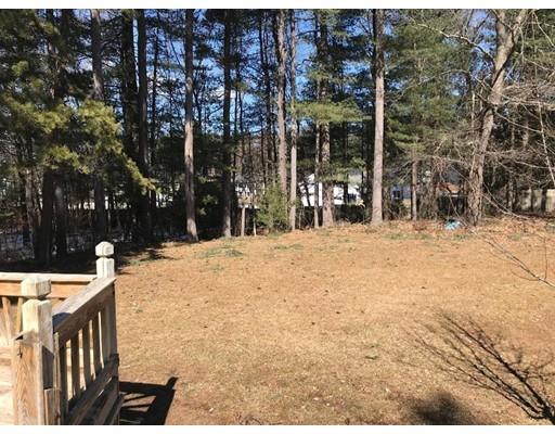 411 Southampton Road Holyoke, MA 01040 - Photo 26 of 27 a view of a yard with wooden fence