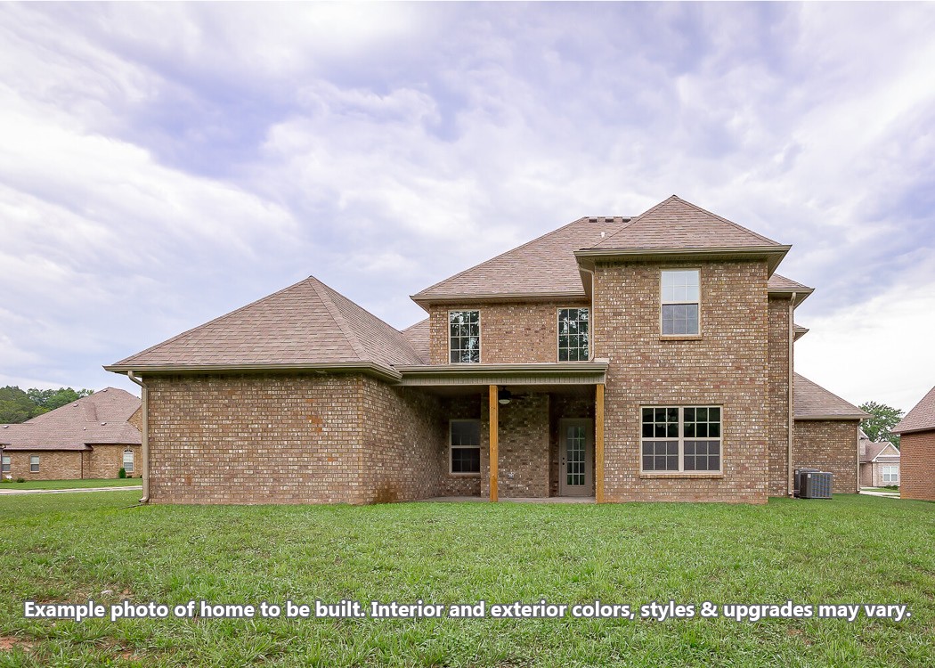 289 Killdeer Drive Clarksville, TN 37040 - Photo 21 of 21 a front view of a house with a garden