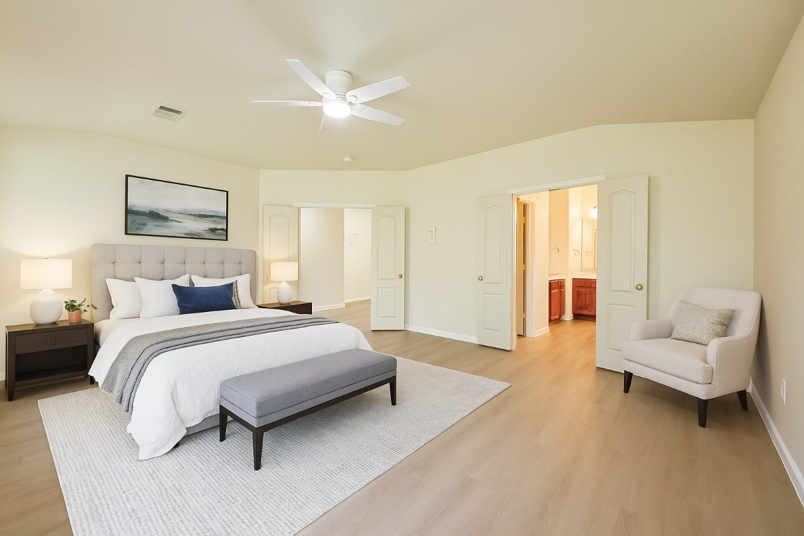 4526 Tello Path Austin, TX 78749 - Photo 11 of 24 a spacious bedroom with a bed and couch